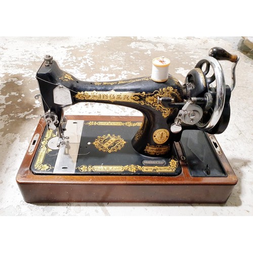 178 - A vintage Singer sewing machine. No shipping. Arrange collection or your own packer and shipper, ple... 