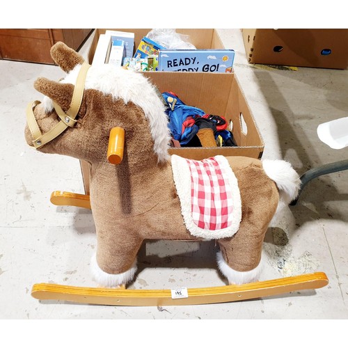 195 - A small rocking horse, height 55cm together with a box of dressing-up items and a box of children's ... 