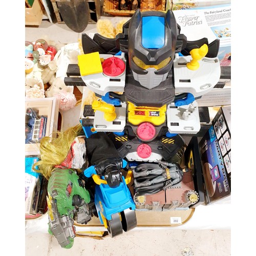 202 - Batman toys and a dinosaur. UK shipping £14.