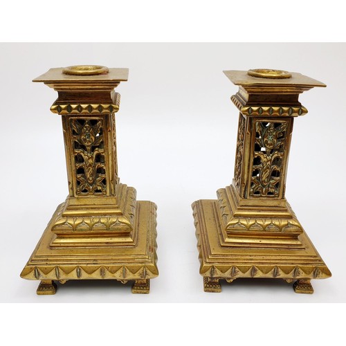 221 - A pair of Victorian brass candlesticks of classical form with pierce work columns, height 14.5cm. UK... 