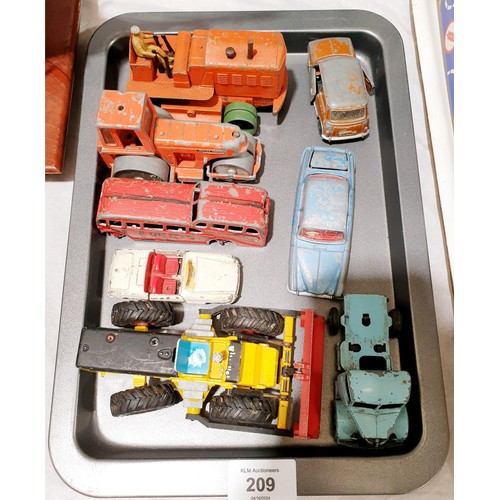 209 - Eight vintage Dinky toy vehicles. UK shipping £14.