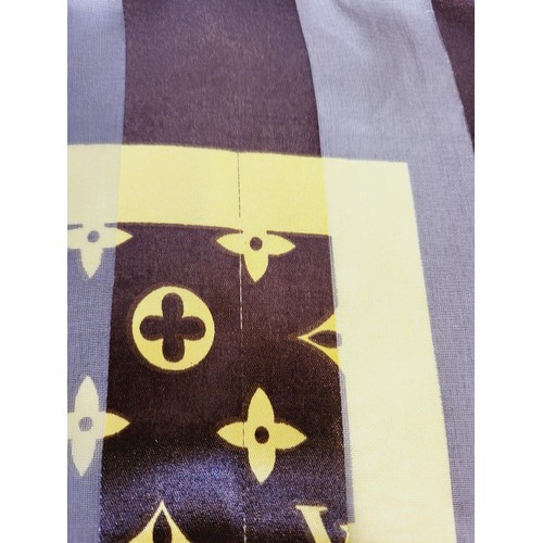 288 - A Louis Vuitton silk scarf. UK shipping £14.