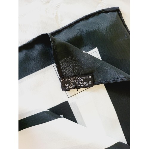 287 - A Yves Saint Laurent silk scarf. UK shipping £14.