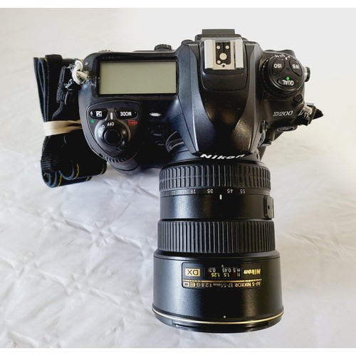 272 - A Nikon D200 camera with an AF-S Nikkor 17-55mm lens. UK shipping £14.