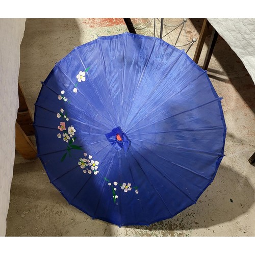 218 - An umbrella stand, a walking stick and a parasol. No shipping. Arrange collection or your own packer... 