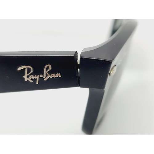 28 - A vintage pair of Ray Ban Wayfarer sunglasses. UK shipping £14.