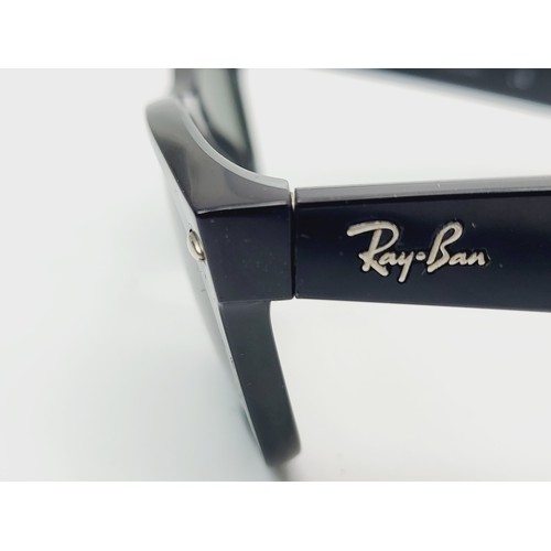 28 - A vintage pair of Ray Ban Wayfarer sunglasses. UK shipping £14.