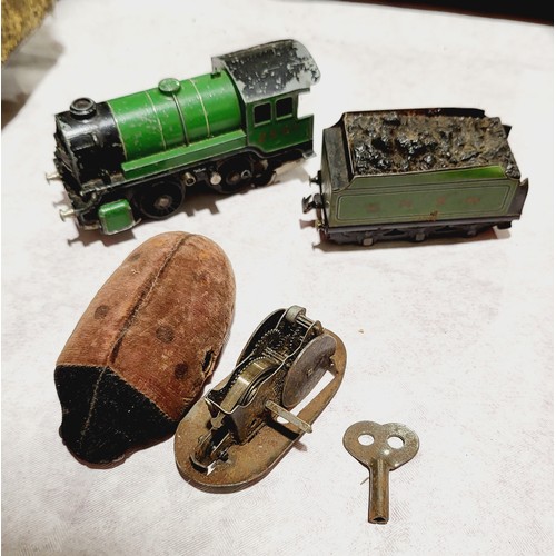 55 - A vintage Schuco clockwork ladybird, a vintage electric Trix TTR train and tender together with othe... 