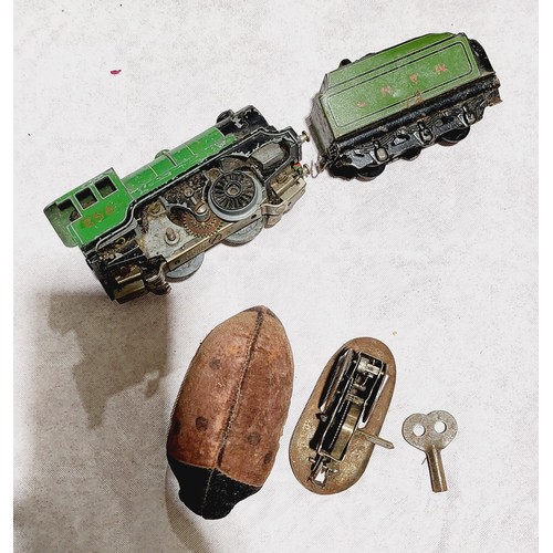 55 - A vintage Schuco clockwork ladybird, a vintage electric Trix TTR train and tender together with othe... 