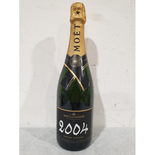 2 - A 750ml bottle of Moet & Chandon Grand Vintage 2004 champagne in presentation box. No shipping. Arra... 