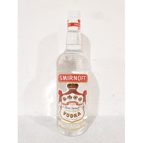 9 - A 1ltr Vintage bottle of Smirnoff Vodka. No shipping. Arrange collection or your own packer and ship... 