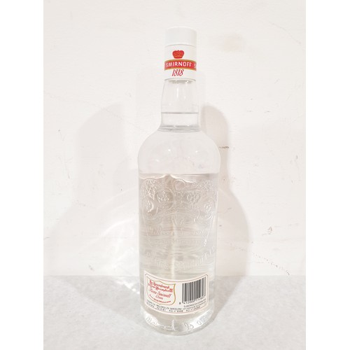 9 - A 1ltr Vintage bottle of Smirnoff Vodka. No shipping. Arrange collection or your own packer and ship... 