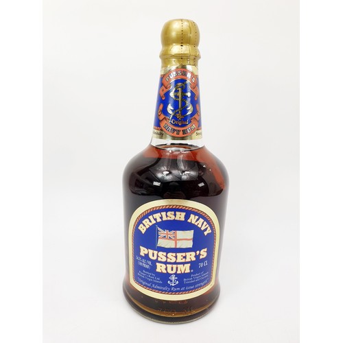 26 - A 70cl bottle of British Navy blue label Pusser's Rum. No Shipping.  Arrange collection or your own ... 