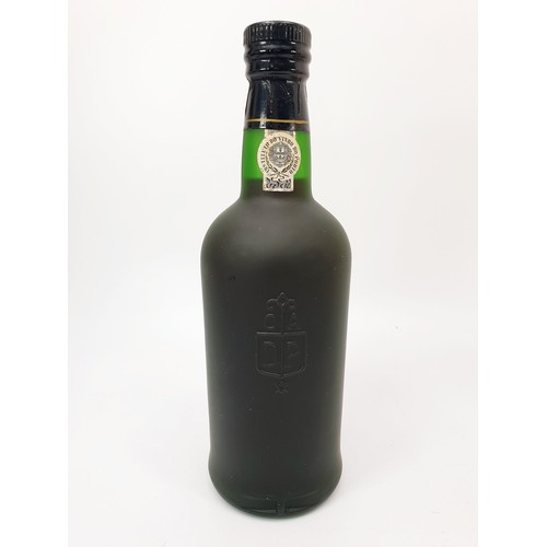 27 - A 75cl bottle of Royal Oporto Special Reserve port of 1940, bottled in 1990, in presentation box. No... 