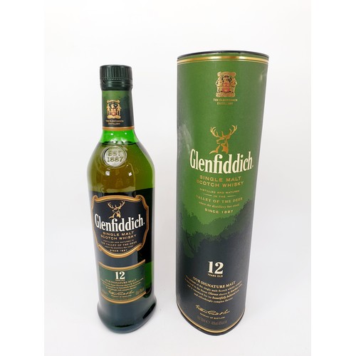 32 - A 70cl bottle of Glenfiddich 12 year old single malt whisky in presentation box. No Shipping.  Arran... 