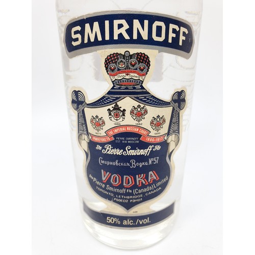 36 - A 1ltr bottle of vintage Canadian blue label Smirnoff vodka. No shipping. Arrange collection or your... 