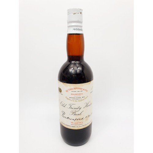 38 - A vintage bottle of Rutherford & Co Old Trinity House Bual Madeira. No shipping. Arrange collection ... 