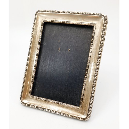 45 - A hallmarked silver photo frame, height 17cm, A/F, Sheffield 1916. UK shipping £14.