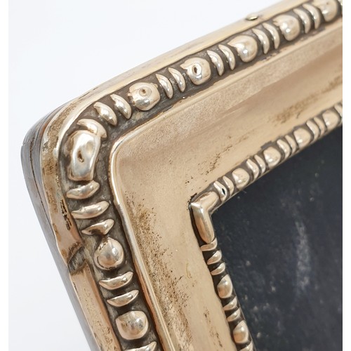 45 - A hallmarked silver photo frame, height 17cm, A/F, Sheffield 1916. UK shipping £14.