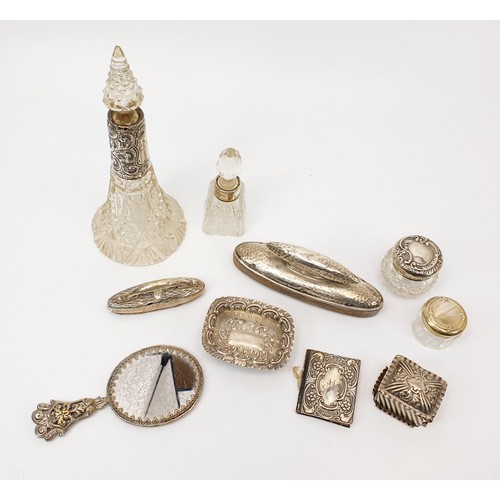 58 - A selection of hallmarked silver items and a silver plated hand mirror and silver plated dressing ta... 