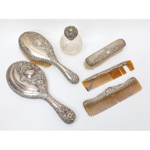 61 - A selection of silver hallmarked dressing table items with Chester and Birmingham hallmarks dating t... 