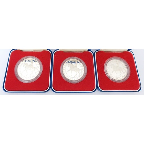 64 - A cased silver proof £1 coin together with four cased silver proof commemorative crowns for the Silv... 