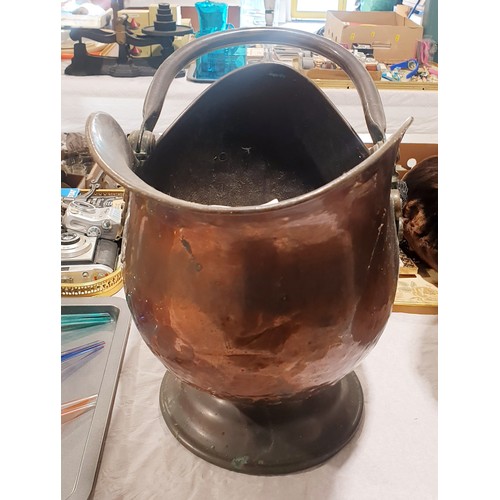 110 - An antique copper coal helmet, height 37cm. No shipping. Arrange your own packer and shipper please.... 