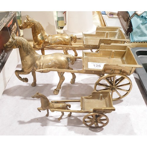 126 - Three brass model horse and carts, the longest 27.5cm. UK shipping £14