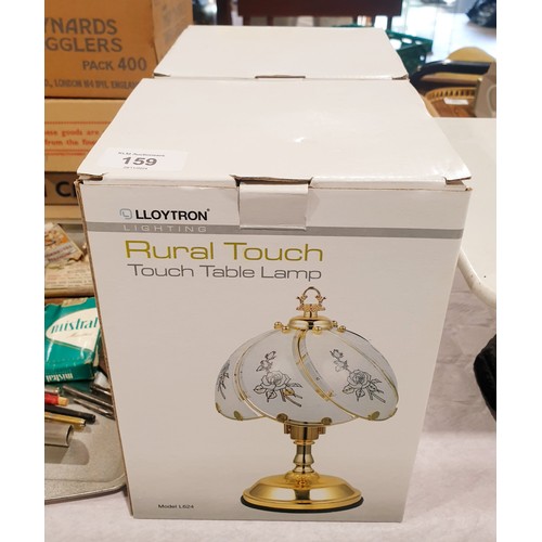 159 - A pair of new in box touch control table lamps. No shipping. Arrange your own packer and shipper ple... 