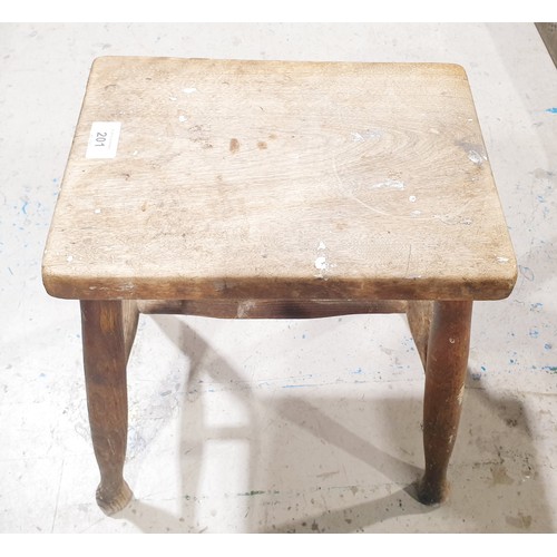 201 - An antique elm four legged stool, height 39.5cm. No shipping. Arrange collection or your own packer ... 