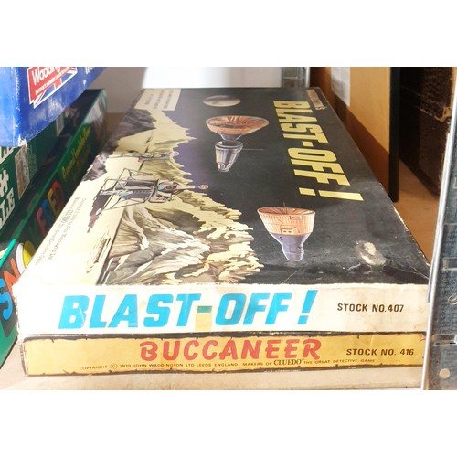 219 - Two vintage Waddington's board games Blast Off and Buccaneer. UK shipping £14.