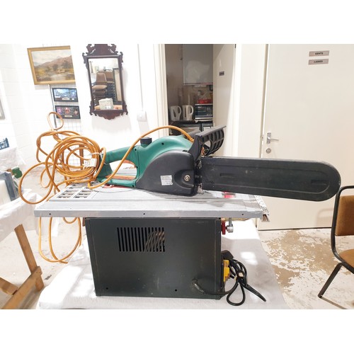 252 - A Parkside table saw together with a Parkside electric chain saw, A/F. No shipping. Arrange collecti... 