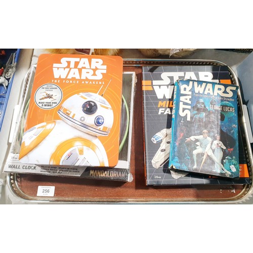 256 - A selection of Star Wars memorabilia. UK shipping £14.