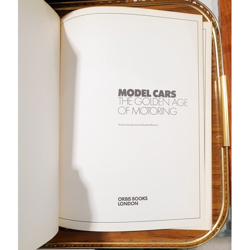 263 - Boxed toy vehicles and a book Model Cars The Golden Age of Motoring. UK shipping £14.