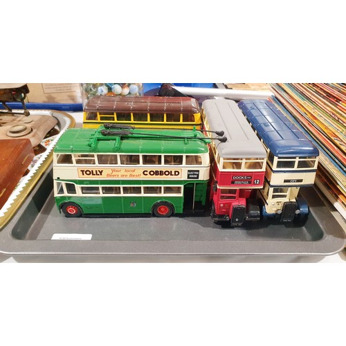 272 - Five Corgi model buses, coaches and trams. UK shipping £14.