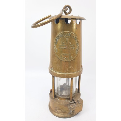 301 - A vintage miner's lamp by Protector Lamp & Lighting Co. Ltd. of Eccles, type 6, height 25.5cm. UK sh... 