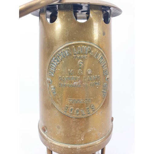 301 - A vintage miner's lamp by Protector Lamp & Lighting Co. Ltd. of Eccles, type 6, height 25.5cm. UK sh... 