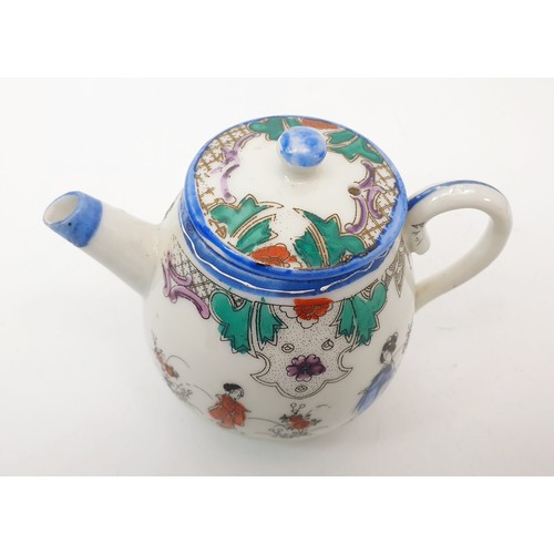 304 - A Chinese porcelain teapot hand finished with figures in a garden, height 9.5cm. No shipping. Arrang... 