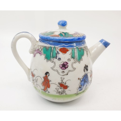 304 - A Chinese porcelain teapot hand finished with figures in a garden, height 9.5cm. No shipping. Arrang... 