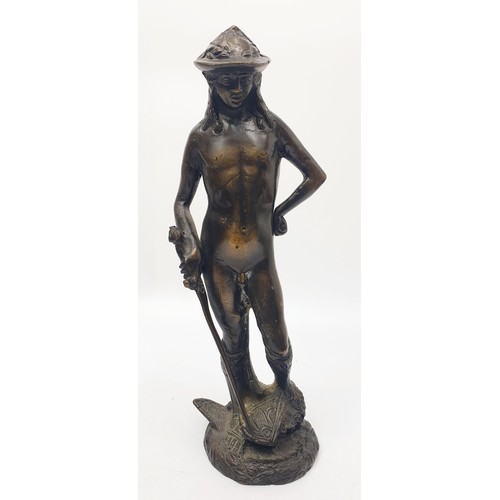 323 - A bronze figure of David after Donatello, height 24.5cm together with a cast metal figure of a balle... 