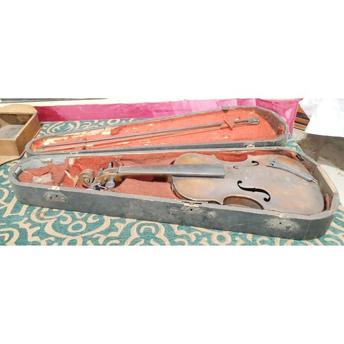 328 - An antique violin having one piece back, back length 35cm, overall length 59cm with case and bow. No... 