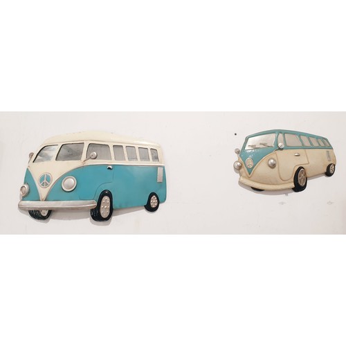 332 - Two tin plate VW  camper wall plaques, the longest 81.5cm together with a model of a VW camper van. ... 