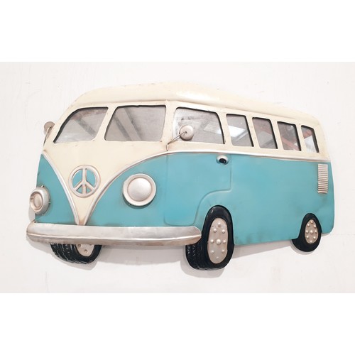 332 - Two tin plate VW  camper wall plaques, the longest 81.5cm together with a model of a VW camper van. ... 