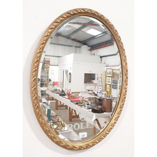 338 - An oval gilt framed mirror etched with the Rolex logo, length 65cm. No shipping. Arrange collection ... 