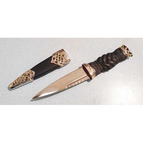 99 - A boxed Celtic Art Ltd. Sgian Dubh, length 19cm. No shipping. Arrange your own packer and shipper pl... 