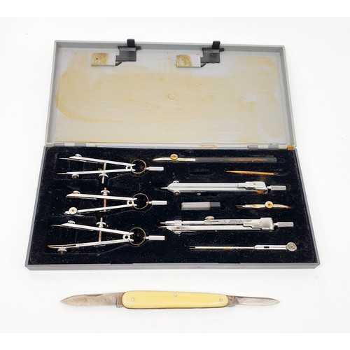 242 - A vintage Jakar drawing set together with a penknife. UK shipping £14.