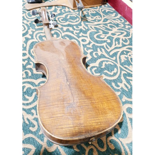 328 - An antique violin having one piece back, back length 35cm, overall length 59cm with case and bow. No... 