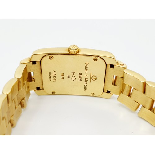 8 - A ladies boxed 18ct gold Baume & Mercier quartz wrist watch, on an 18ct gold bracelet, having a cham... 