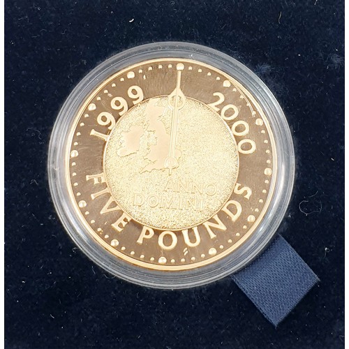 11 - A boxed Year 2000 Millennium gold proof £5 coin.