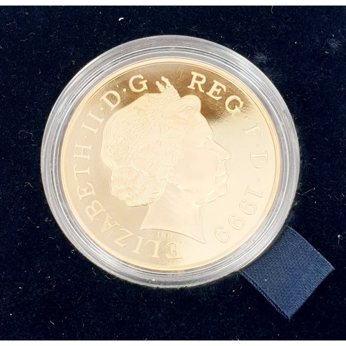 11 - A boxed Year 2000 Millennium gold proof £5 coin.